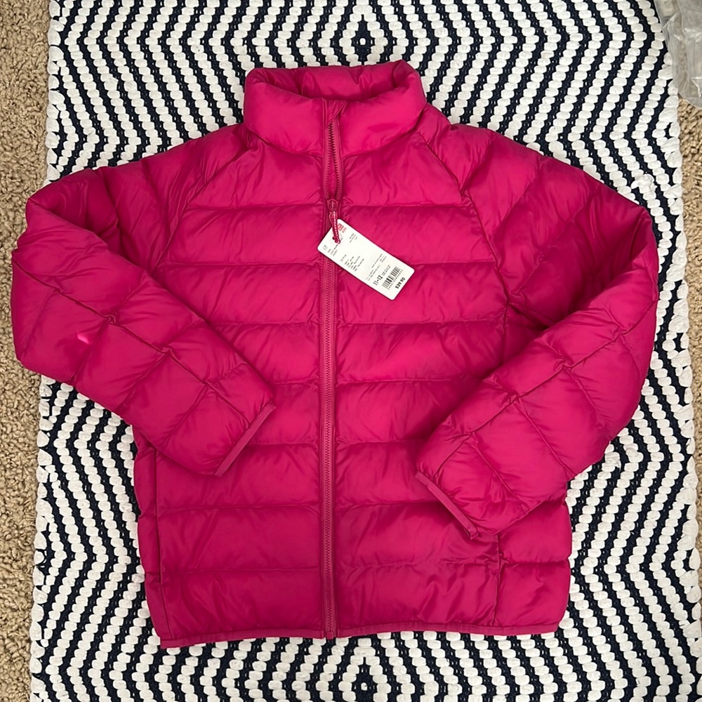 Kids Uniqlo, pink puffer jacket in size 11-12.